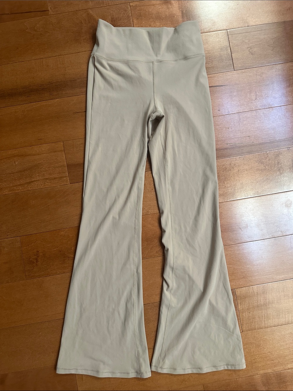 Vuori High-Waist Flare Yoga Pants in Light Beige